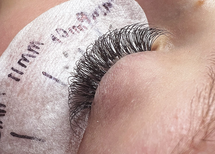 close up of russian lashes being appiled